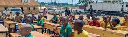 Students using new classroom desks